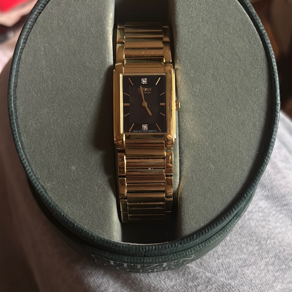 Citizen women’s Gold and diamond eco drive